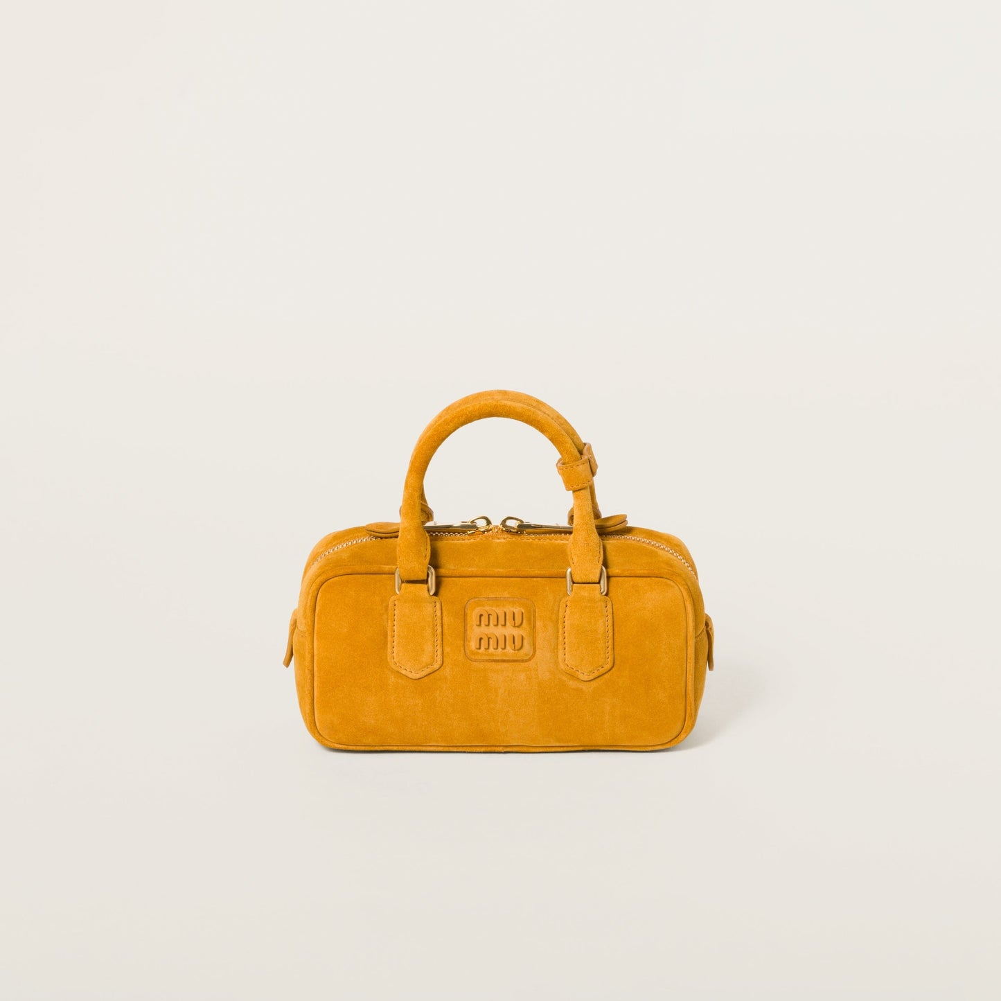 Arcadie padded suede top-handle bag