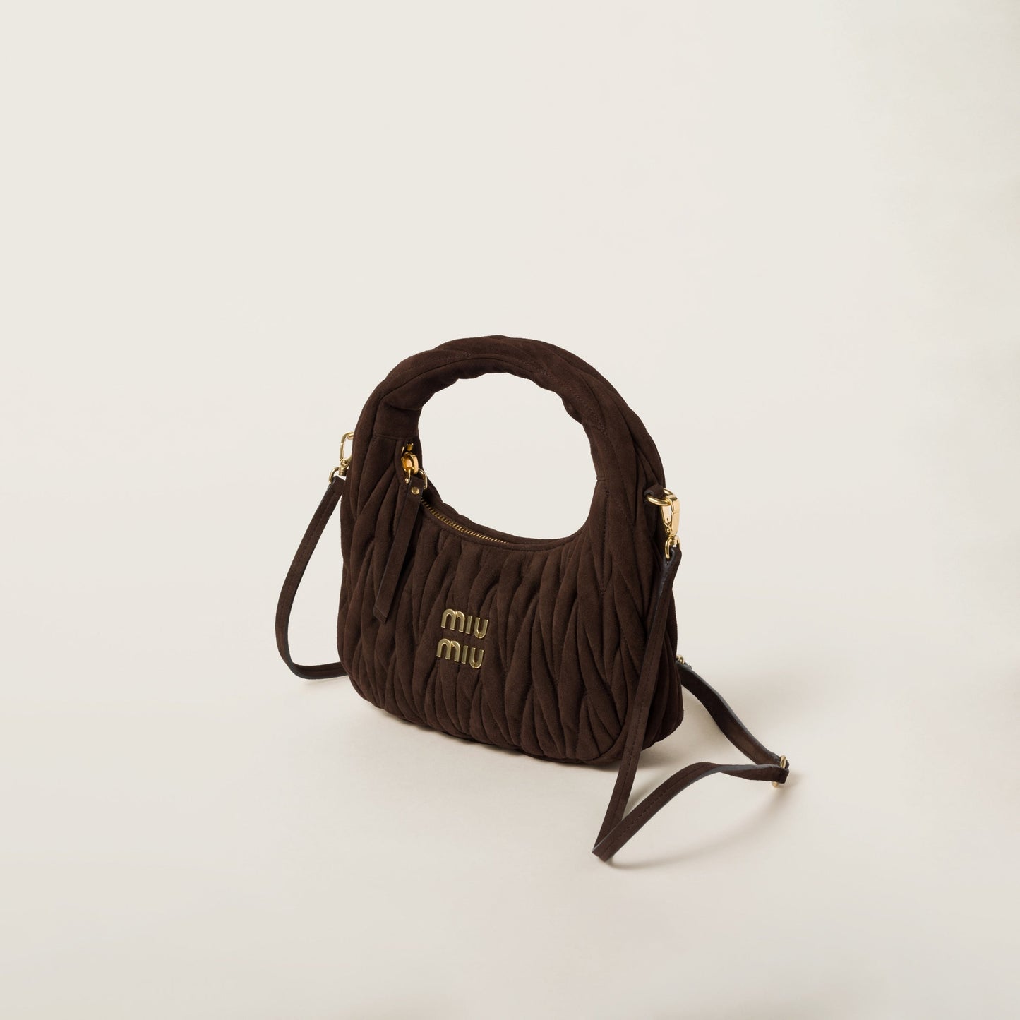 Wander matelassé suede hobo bag