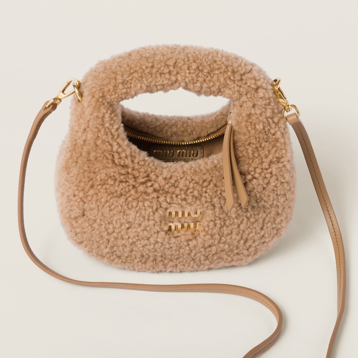 Wander shearling hobo bag with leather details